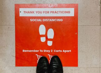 Could a New App Help Your Employees with Social Distancing? social distancing floor graphic COVID-19